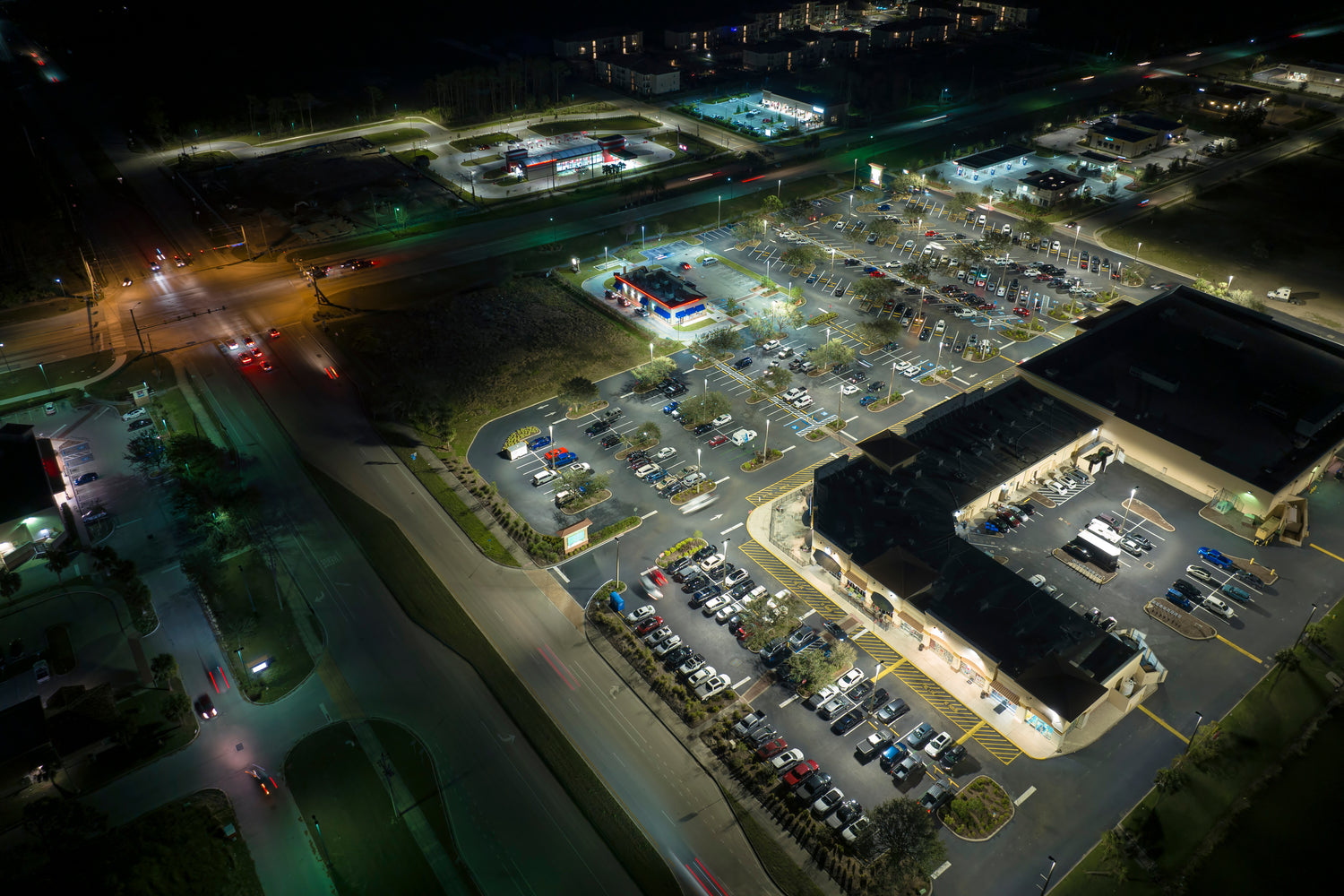 Angled view of town with busy parking lots